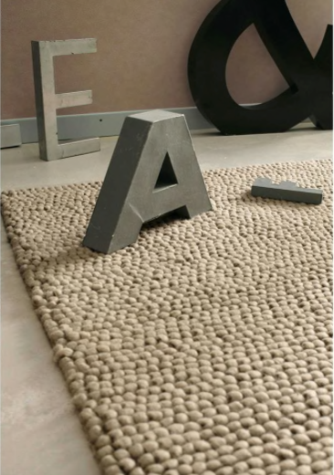 Tapis Cocaes en laine tissée relief